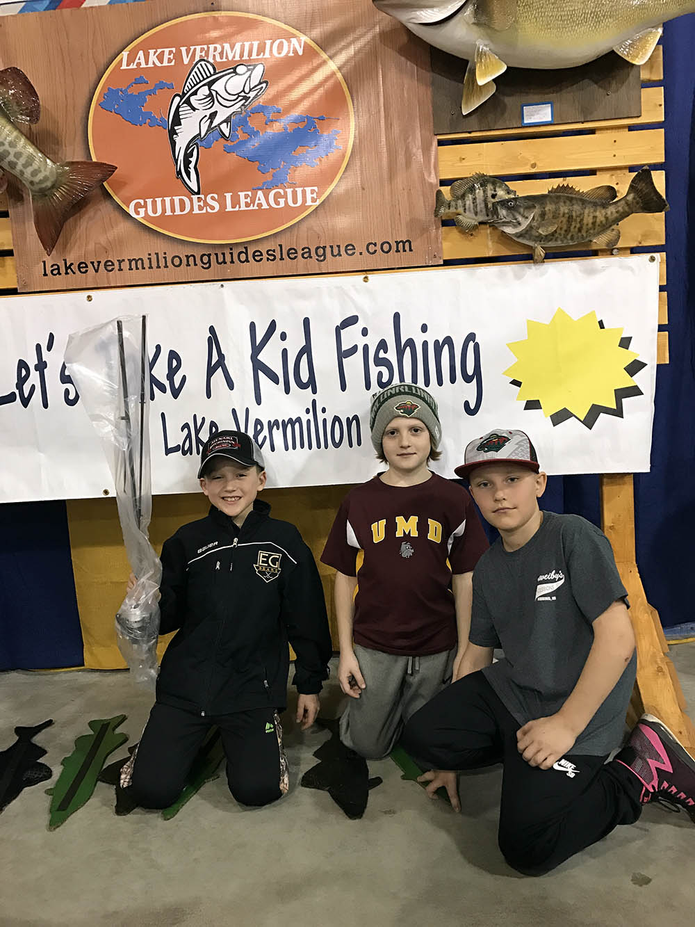 Kids posing for Lets Take a Kid Fishing event
